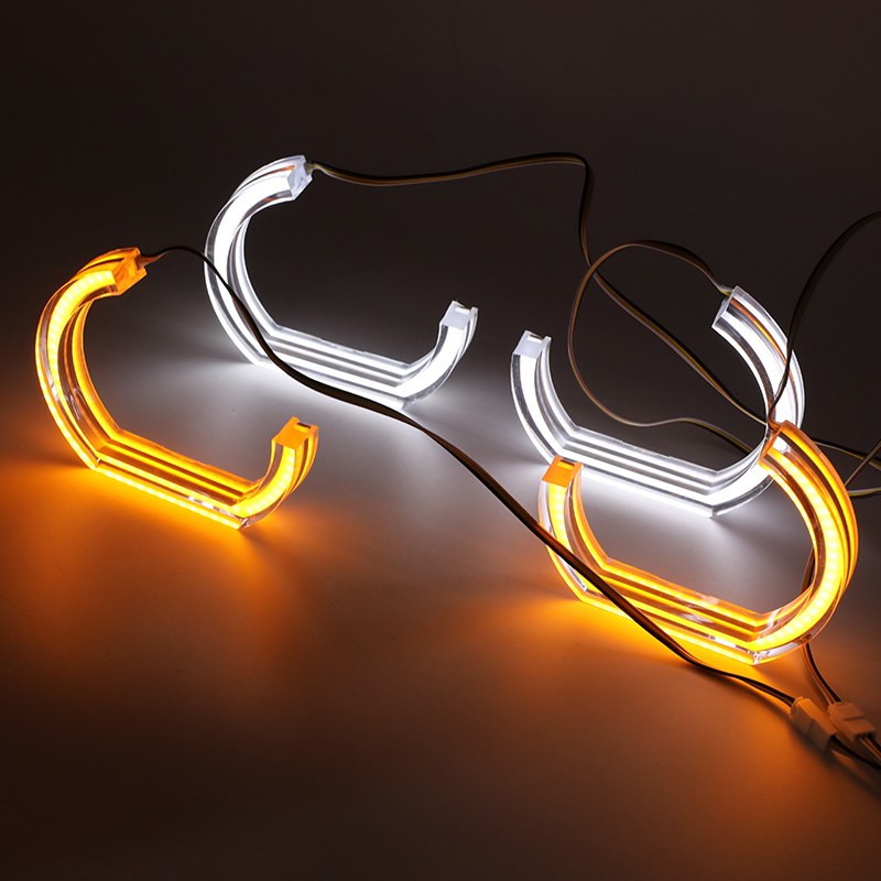 U-shaped white amber crystal angel eyes used as a size and lighting-effect reference