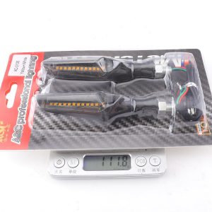 Packing image showing AC-0105 yellow plus white reference and 111.8 g scale reading; confirm final packing weight by batch.