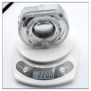 Led Devil Eye Lens Light Weight Packing Reference Source image showing the product on a scale for packing and weight checking.