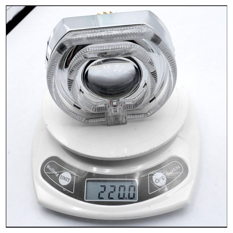 Led Devil Eye Lens Light Weight Packing Reference Source image showing the product on a scale for packing and weight checking.