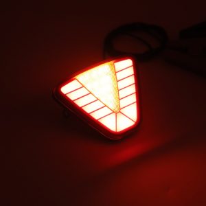 Lighting-effect product photo showing the triangular illuminated pattern.