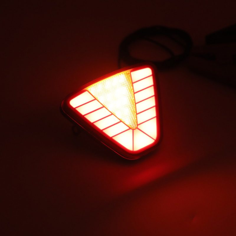 Lighting-effect product photo showing the triangular illuminated pattern.